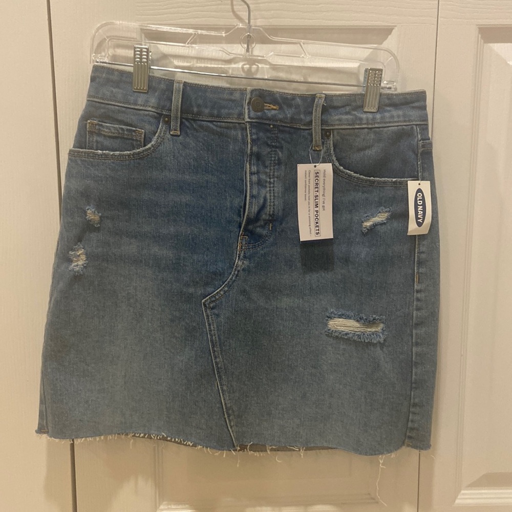 Medium wash destructed denim skirt w secret slim pockets NWT